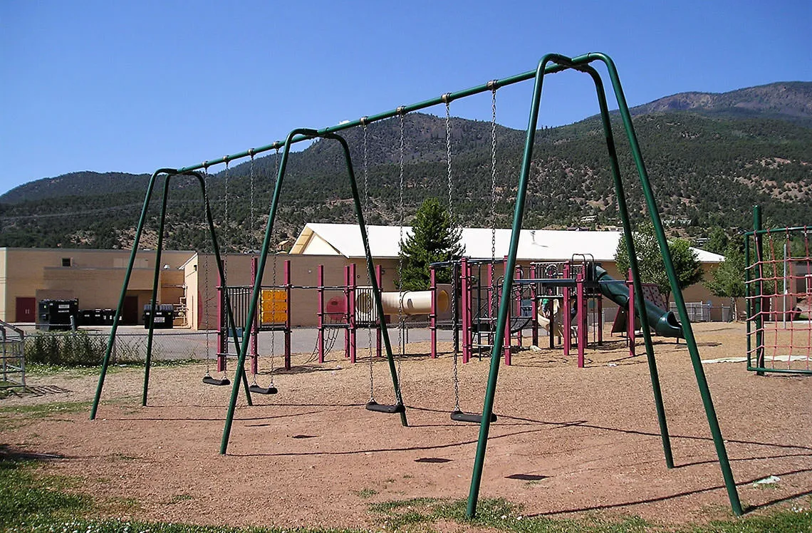 Double swings at Basalt School playground in Basalt, CO